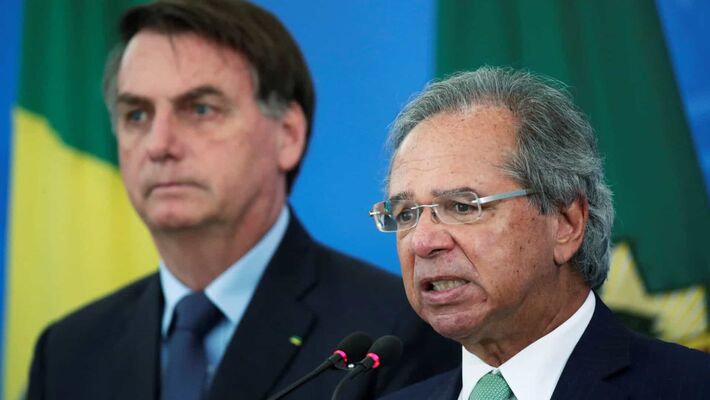 Esses são Paulo Guedes (ministro da Economia) e Jair Bolsonaro (presidente). Foto:  Reuters