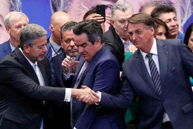 O presidente da Câmara, Arthur Lira, com o ministro Ciro Nogueira e o presidente Jair Bolsonaro. Foto: Adriano Machado/Reuters