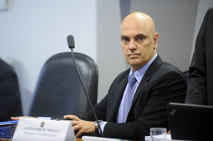  À mesa, o ministro do Supremo Tribunal Federal (STF), Alexandre de Moraes. Foto: Marcos Oliveira/Agência Senado