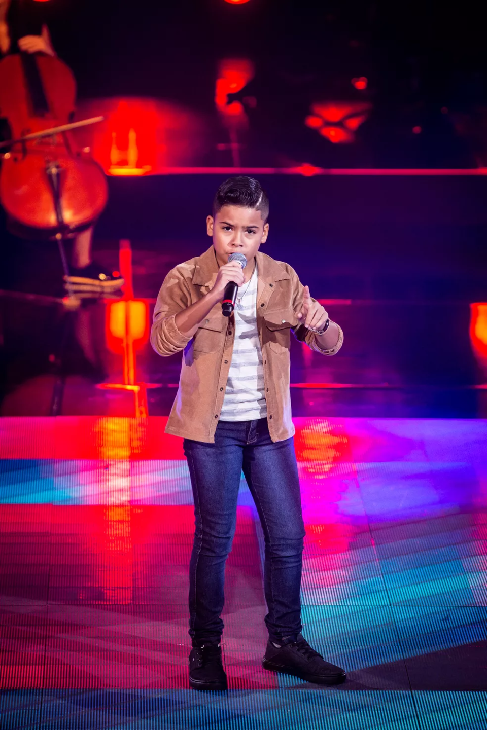 Matheus é de Campo Grande, MS. Ele cantou 'Amor Distante' nas Audições e entrou para o Time Brown do The Voice Kids.Foto: The Voice Kids | TV Globo
